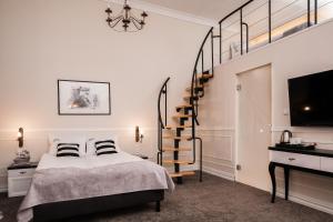 Posteľ alebo postele v izbe v ubytovaní Imagine Apartments