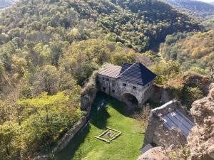 an aerial view of a building on a mountain at Lazy in Tiny in Hrušov