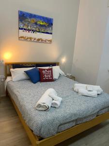 Postel nebo postele na pokoji v ubytování Malila's-Cipitelli San Pietro