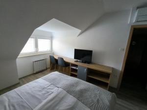 Voodi või voodid majutusasutuse Guesthouse Haler toas