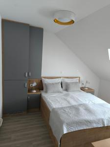 Voodi või voodid majutusasutuse Guesthouse Haler toas