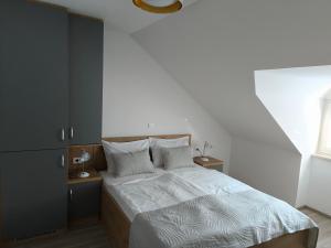 Voodi või voodid majutusasutuse Guesthouse Haler toas