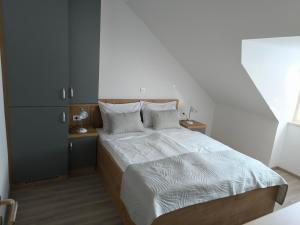 Voodi või voodid majutusasutuse Guesthouse Haler toas