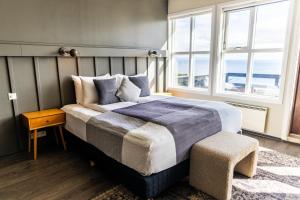 Cama o camas de una habitación en Fosshotel Hellnar
