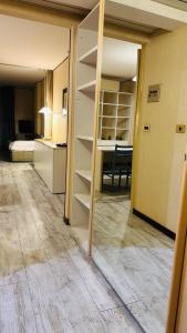 Ένα ή περισσότερα κρεβάτια σε δωμάτιο στο Universo room 318