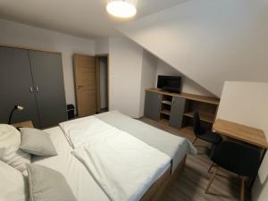 Voodi või voodid majutusasutuse Guesthouse Haler toas
