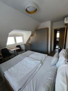 Voodi või voodid majutusasutuse Guesthouse Haler toas
