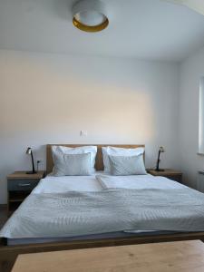 Voodi või voodid majutusasutuse Guesthouse Haler toas