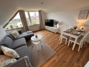 Posezení v ubytování Ferienwohnung Deichblick