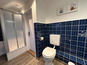 Koupelna v ubytování Ferienwohnung Deichblick