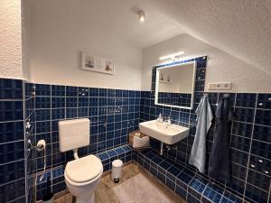 Koupelna v ubytování Ferienwohnung Deichblick