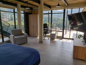 Un lugar para sentarse en Sasaima Chalet Turei (G7)