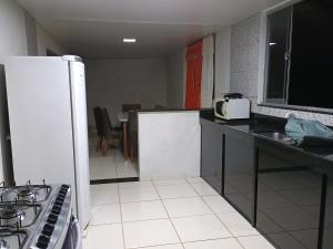 Kuchyň nebo kuchyňský kout v ubytování Casa Mayara