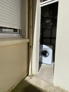 a washer and dryer in a corner of a house at Rance solidor ter in Saint Malo