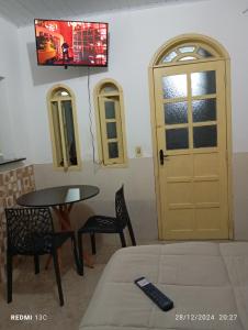 Et tv og/eller underholdning på Loft da Praia