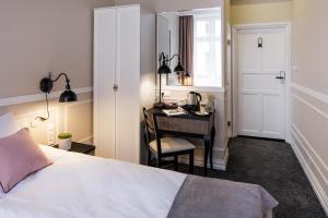Posteľ alebo postele v izbe v ubytovaní Imagine Apartments