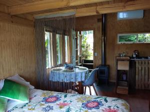 Postel nebo postele na pokoji v ubytování Fío Fío Patagonia