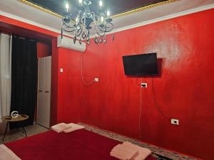 TV a/nebo společenská místnost v ubytování Bob Marley Bnb & Hostel