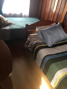 En eller flere senge i et værelse på Cabaña cómoda por día