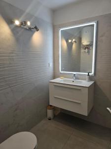 Ένα μπάνιο στο Appartement Ti Pai