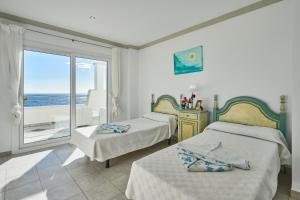 Postel nebo postele na pokoji v ubytování Villa Estella Matutina + 44 fotografií