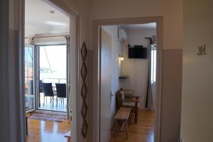 TV a/nebo společenská místnost v ubytování Sea And Sun apartments 304 Ιδιωτικό διαμέρισμα