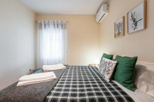 Ένα ή περισσότερα κρεβάτια σε δωμάτιο στο A casa do Gi - 1
