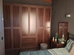 Postel nebo postele na pokoji v ubytování Ex fienile nella natura - Camera con bagno privato e spazi comuni