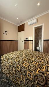Letto o letti in una camera di Bed and Breakfast Eritrea