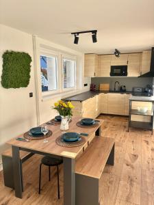 Kuchyň nebo kuchyňský kout v ubytování Apartmány Faunapark