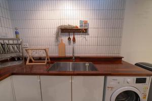 Kuchyň nebo kuchyňský kout v ubytování Cloud 9 Hongdae