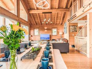 a dining room with a long table in a house at Chalet Gingembre 12 by Interhome in Nendaz