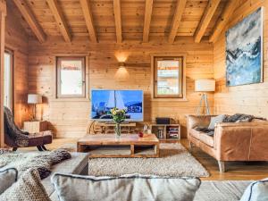 TV a/nebo společenská místnost v ubytování Chalet Gingembre 12 by Interhome