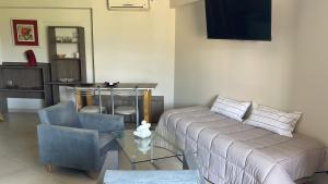 Χώρος καθιστικού στο Monoambiente Village Golf