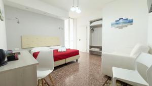Postel nebo postele na pokoji v ubytování Nautilus Hotel