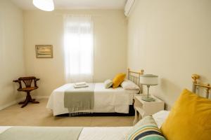 Et opholdsområde på Encantadora casa en barrio de Triana