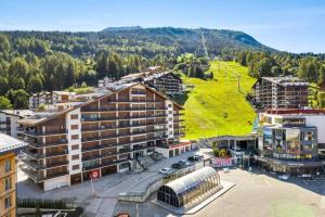 an aerial view of a building in a city at Haute-Nendaz in Nendaz
