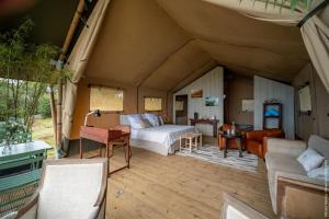 Postel nebo postele na pokoji v ubytování Hôtel Diana Dea Lodge & SPA