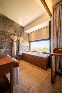 Postel nebo postele na pokoji v ubytování Hôtel Diana Dea Lodge & SPA