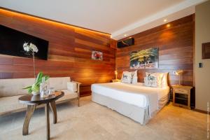 Postel nebo postele na pokoji v ubytování Hôtel Diana Dea Lodge & SPA