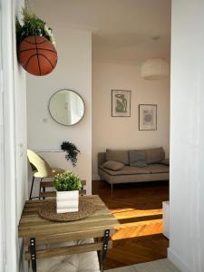 a living room with a table and a couch at Exclusive Top Floor - Love Suite in Nice +7 photos