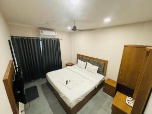 Ein Bett oder Betten in einem Zimmer der Unterkunft Hotel StayInn