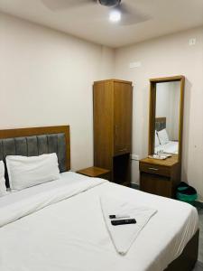 Ein Bett oder Betten in einem Zimmer der Unterkunft Hotel StayInn