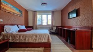 Uma cama ou camas num quarto em La Dora Mountain Resort