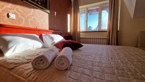 Uma cama ou camas num quarto em La Dora Mountain Resort