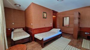 Uma cama ou camas num quarto em La Dora Mountain Resort