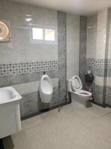 Koupelna v ubytování น่านน้ำโฮม + 9 fotografií