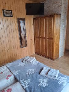Łóżko lub łóżka w pokoju w obiekcie Noclegi Brzegi