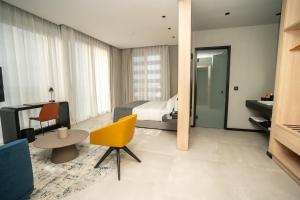 Sama Hotels客房内的一张或多张床位