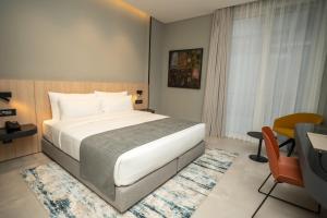 Sama Hotels客房内的一张或多张床位